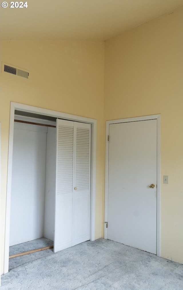 unfurnished bedroom with a closet