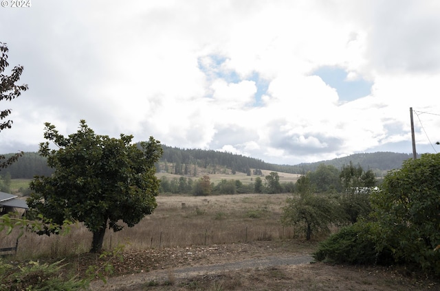 view of mountain feature featuring a rural view