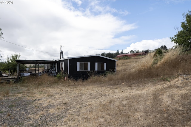 view of outdoor structure featuring a carport