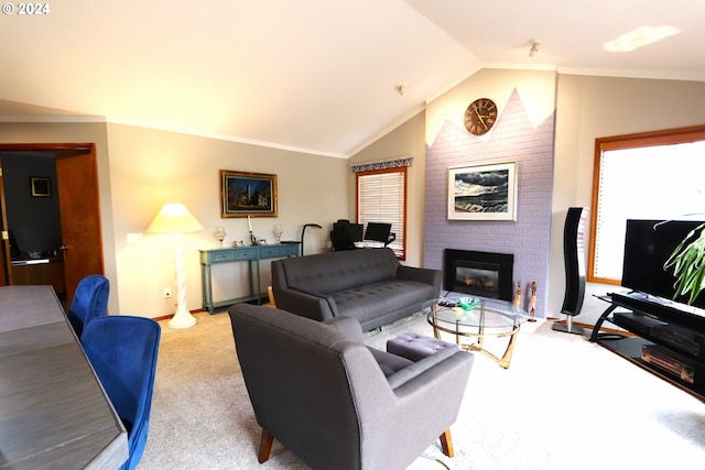 carpeted living room with lofted ceiling and a fireplace