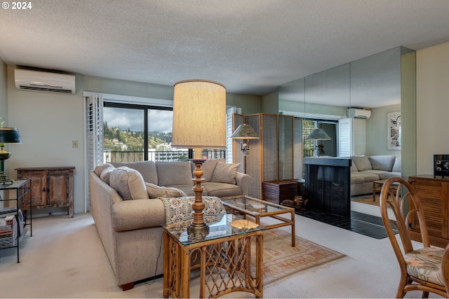 living room with light colored carpet, a wall mounted air conditioner, and a textured ceiling