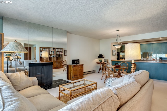 carpeted living room with a baseboard radiator and a textured ceiling