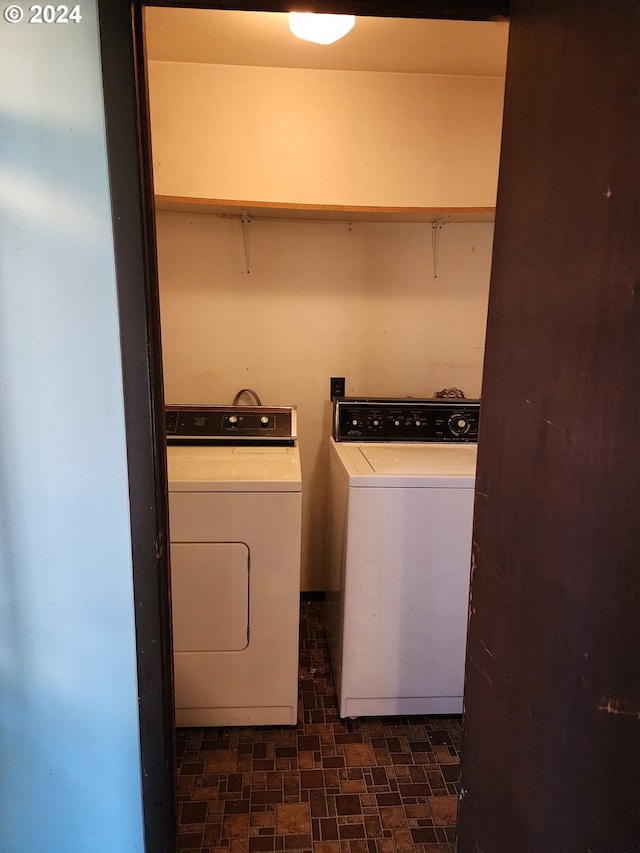 washroom featuring independent washer and dryer