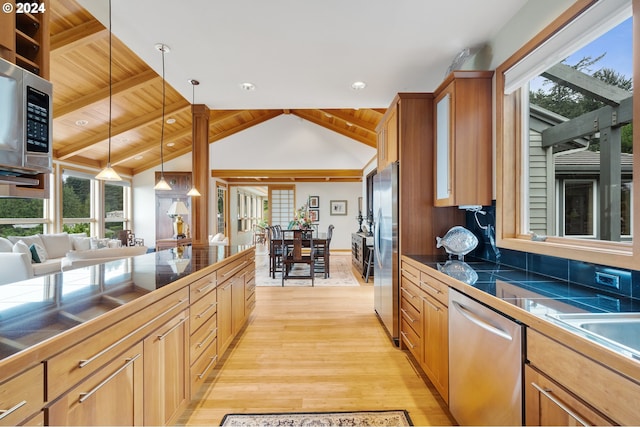 kitchen with lofted ceiling with beams, light wood-style flooring, wood ceiling, decorative light fixtures, and stainless steel appliances