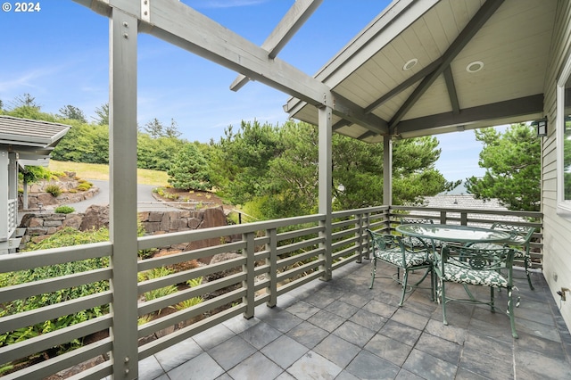 balcony with outdoor dining area