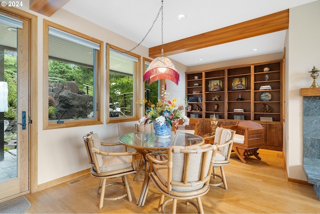 dining area with baseboards, recessed lighting, visible vents, and light wood-style floors