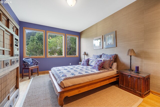 bedroom featuring light wood-type flooring