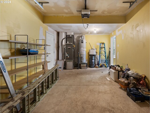 garage with gas water heater, a garage door opener, and heating unit