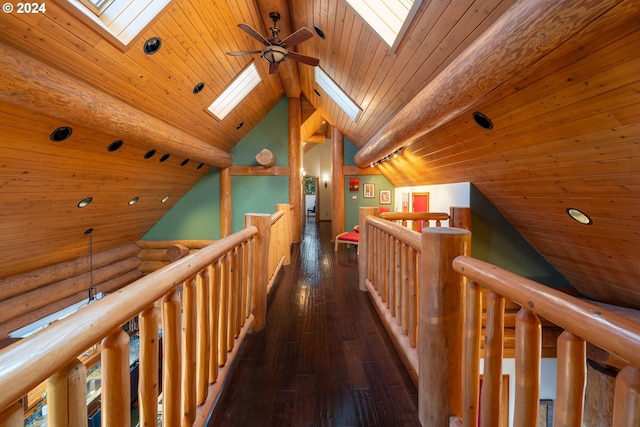 corridor featuring vaulted ceiling with skylight, wood ceiling, and dark hardwood / wood-style flooring