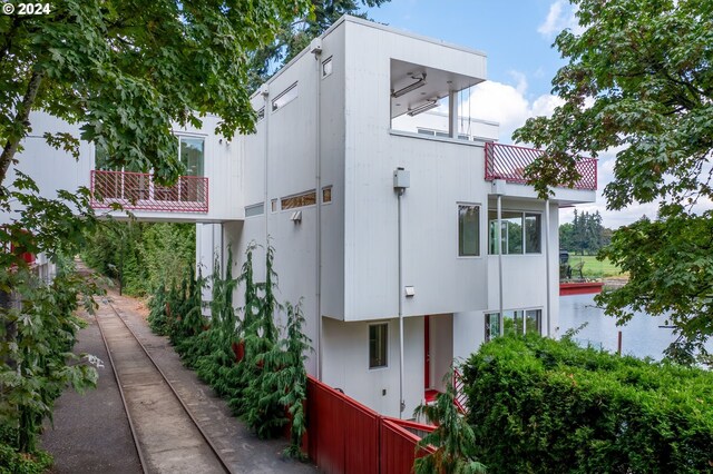 view of property exterior featuring a balcony