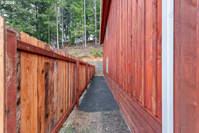 view of side of property with fence