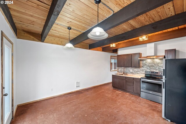 kitchen featuring baseboards, freestanding refrigerator, stainless steel range with electric cooktop, decorative backsplash, and wall chimney range hood