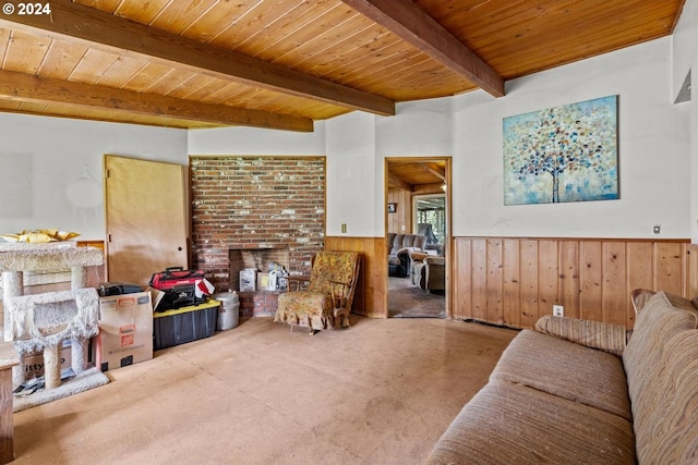 living room with wood ceiling, beam ceiling, and wood walls