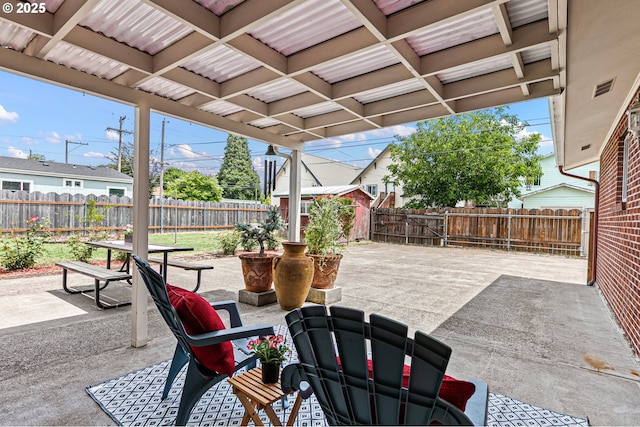 970 Kalmia St, Junction City, OR 97448 - fenced backyard featuring a storage unit and a patio area