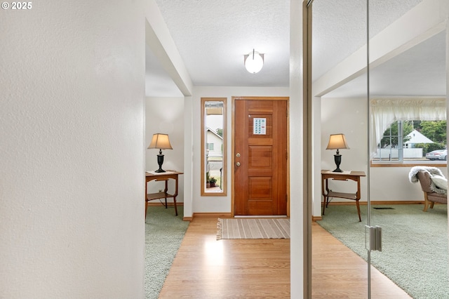 970 Kalmia St, Junction City, OR 97448 - entryway with wood finished floors and a textured ceiling