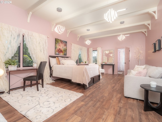 bedroom featuring an inviting chandelier, dark wood-type flooring, and beamed ceiling