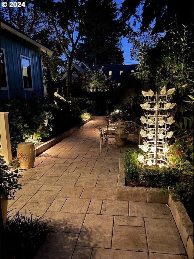 view of patio terrace at twilight