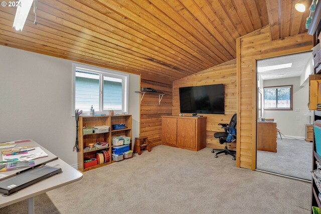 carpeted office with lofted ceiling, wooden walls, and wood ceiling