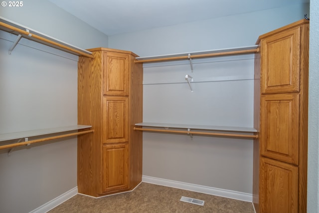 walk in closet featuring visible vents