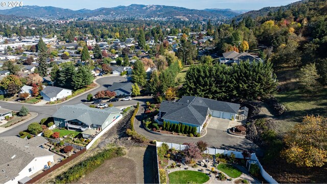 drone / aerial view featuring a mountain view