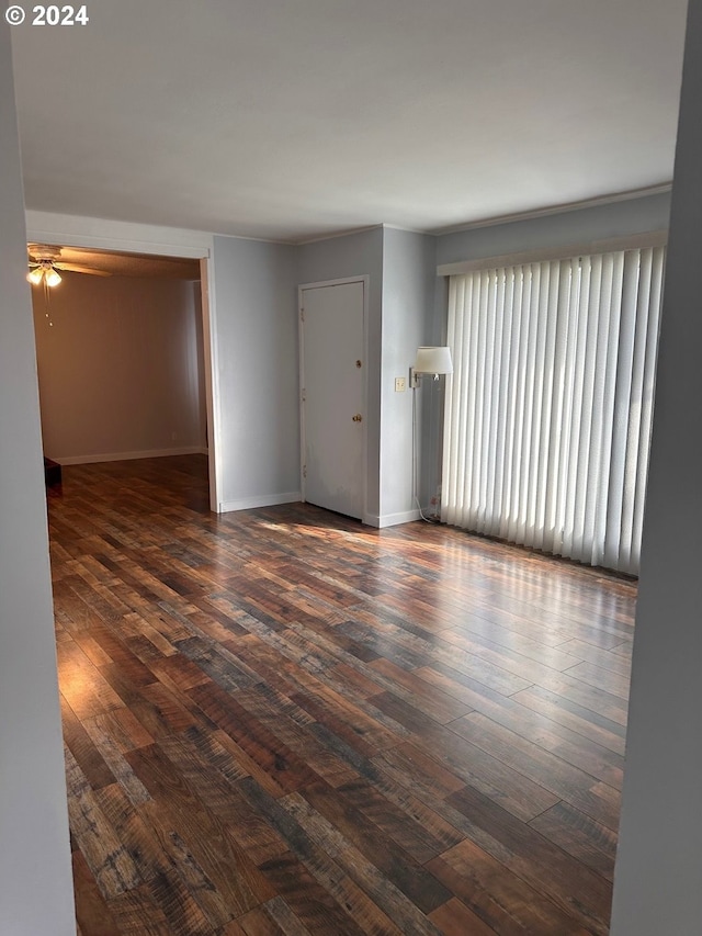 1106 N Myrtle Rd, Myrtle Creek, OR 97457 - spare room featuring dark wood-type flooring and a ceiling fan