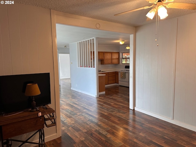 1106 N Myrtle Rd, Myrtle Creek, OR 97457 - living room with dark wood finished floors, ceiling fan, and a textured ceiling