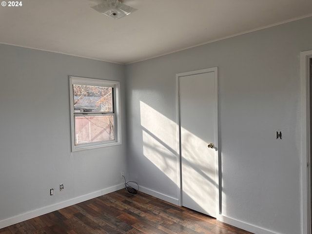 1106 N Myrtle Rd, Myrtle Creek, OR 97457 - empty room with dark wood-style floors and baseboards