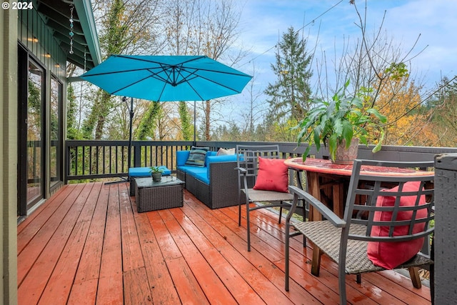 deck featuring outdoor lounge area