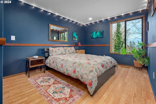 bedroom featuring light hardwood / wood-style floors