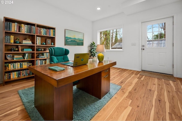 home office with light wood-type flooring