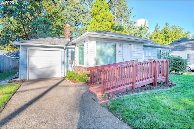 ranch-style home with a garage, a deck, and a front yard