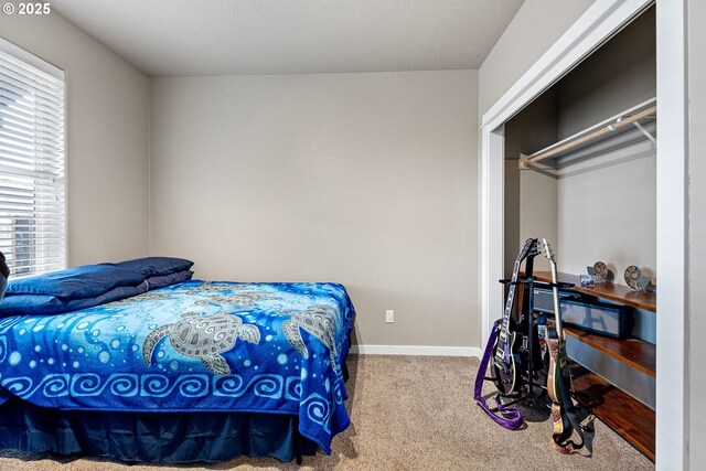 bedroom with light colored carpet