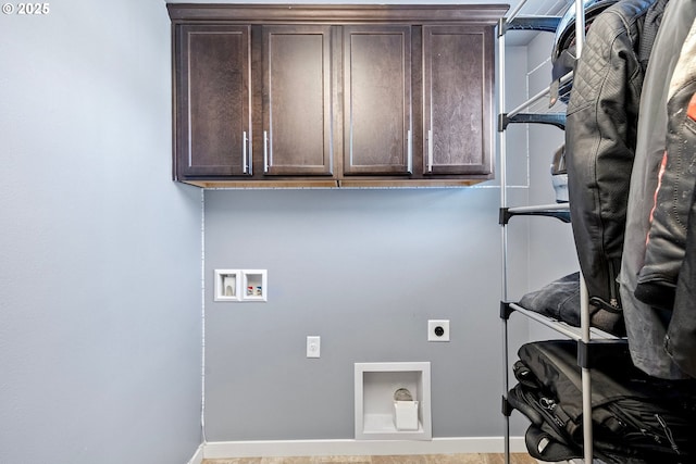 laundry area featuring cabinet space, hookup for an electric dryer, baseboards, and washer hookup