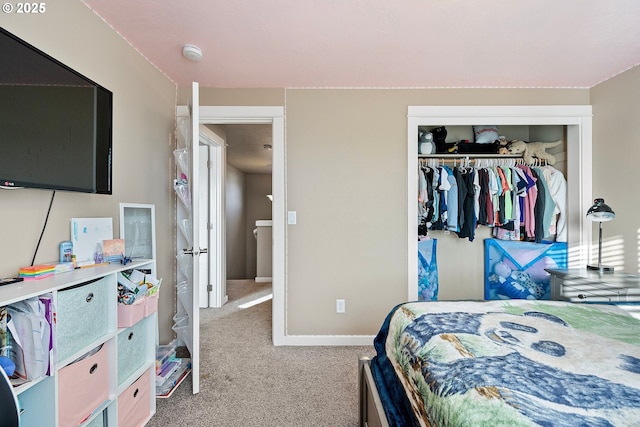 carpeted bedroom with a closet