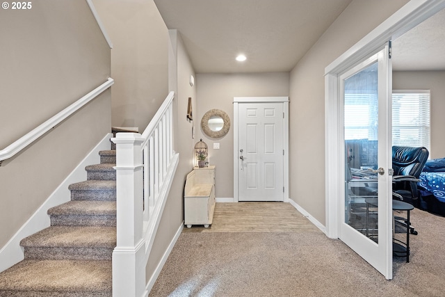 entrance foyer featuring stairway, carpet flooring, recessed lighting, and baseboards