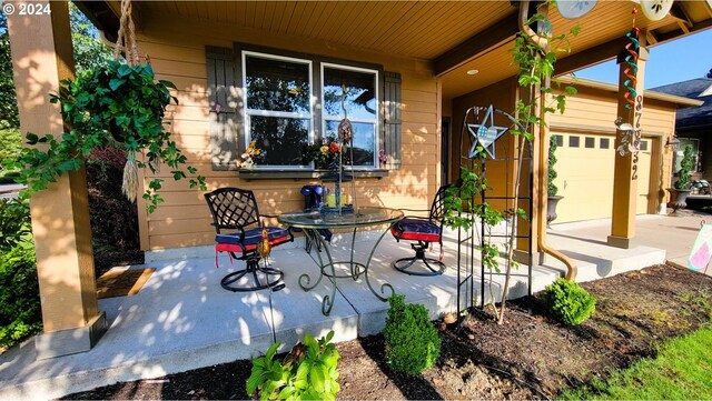 view of patio with a garage