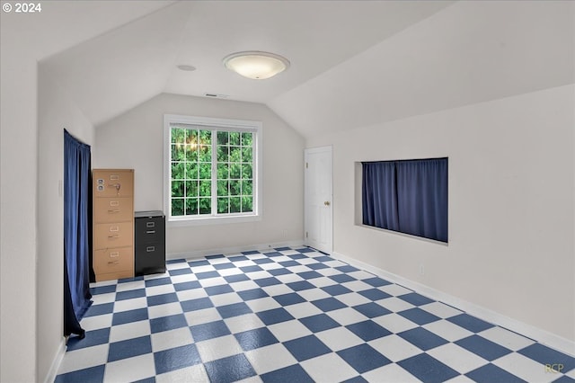 bonus room featuring lofted ceiling