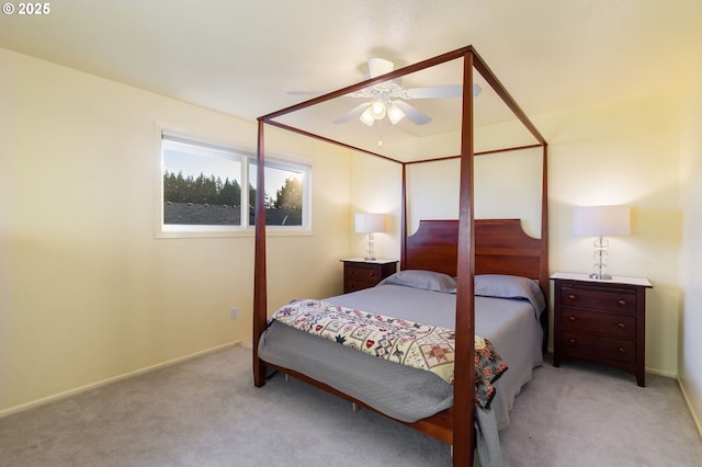 bedroom featuring ceiling fan and light colored carpet