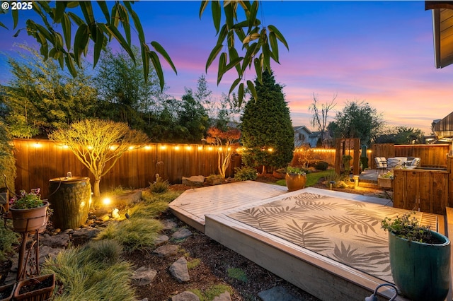 view of patio terrace at dusk