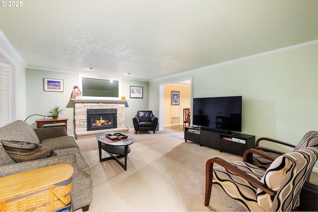 carpeted living room with a textured ceiling, a stone fireplace, and ornamental molding