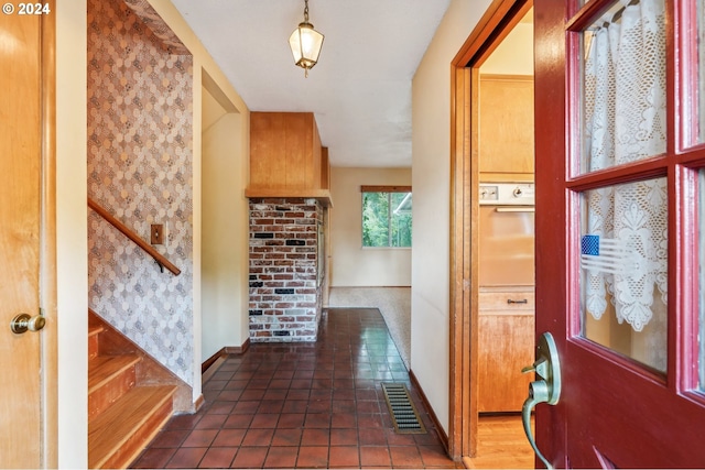 view of tiled foyer entrance