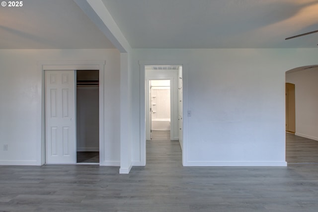 unfurnished bedroom featuring a closet and light wood-type flooring