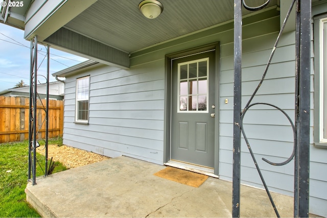 doorway to property with a patio