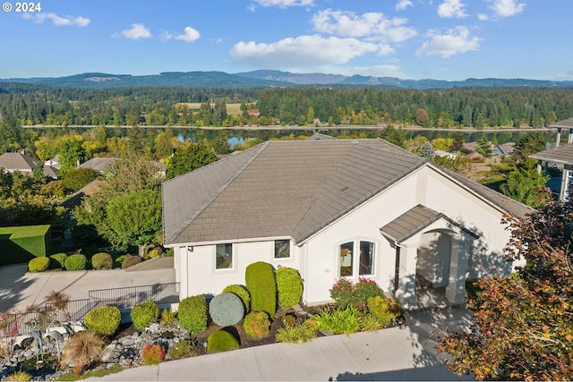 birds eye view of property featuring a mountain view