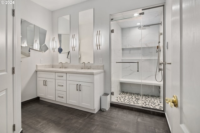 bathroom featuring vanity and walk in shower