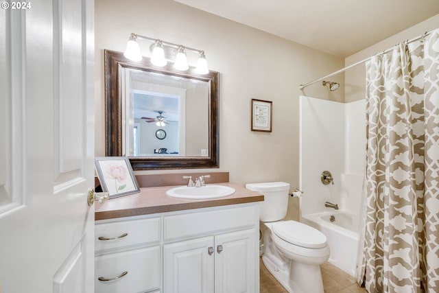 full bathroom with vanity, tile patterned flooring, ceiling fan, toilet, and shower / tub combo