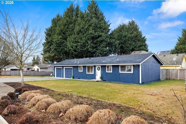 ranch-style home with a garage and a front yard