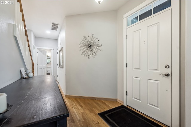 foyer entrance featuring light hardwood / wood-style flooring