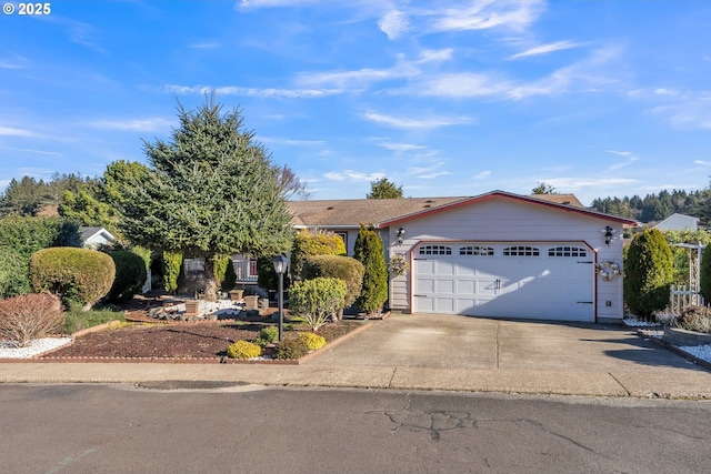 single story home featuring a garage