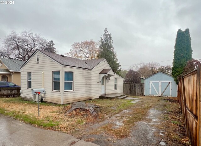 exterior space with a storage shed